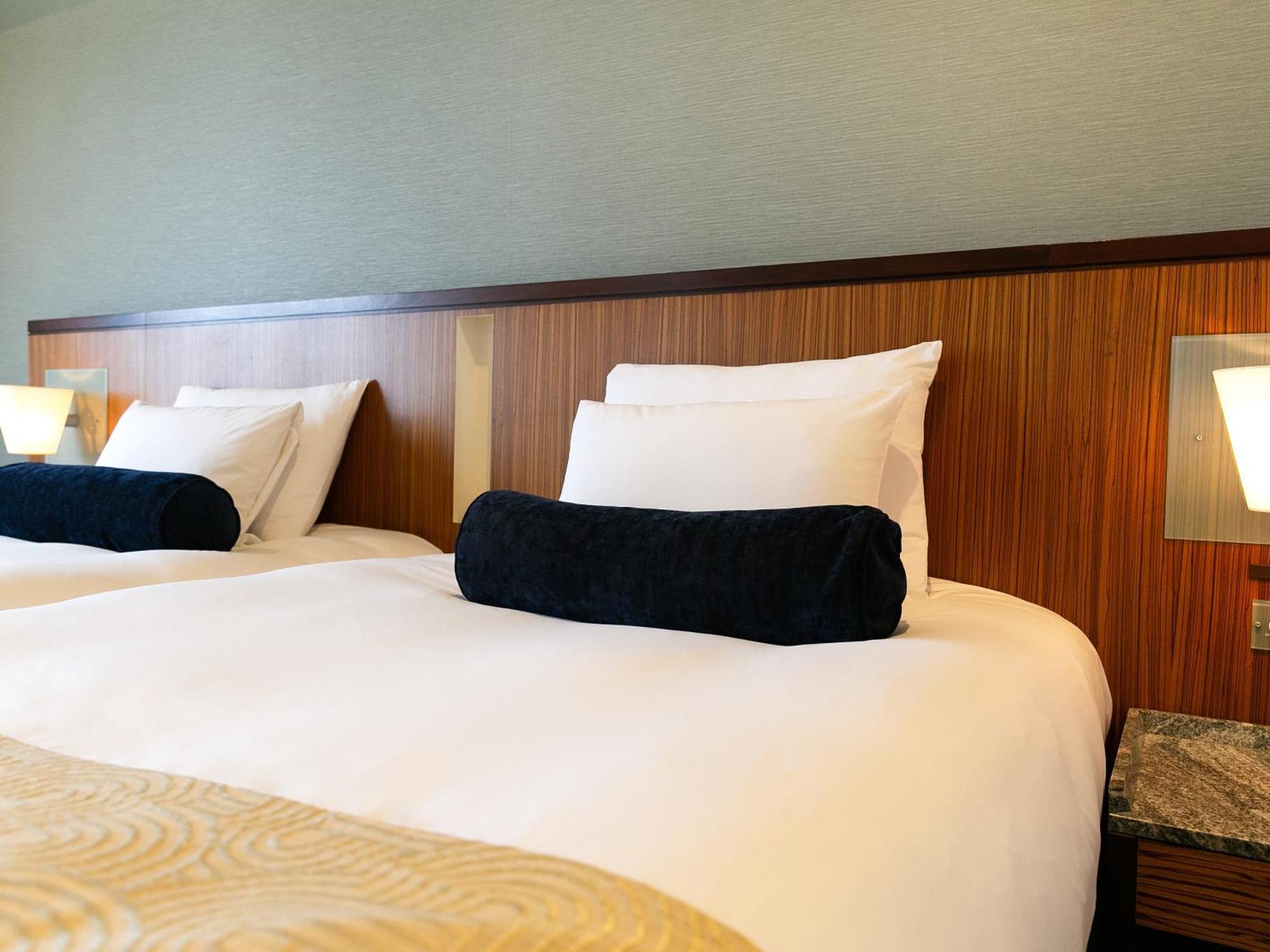 Hotel Nikko Alivila Yomitan Exteriér fotografie A bed with a bolster
